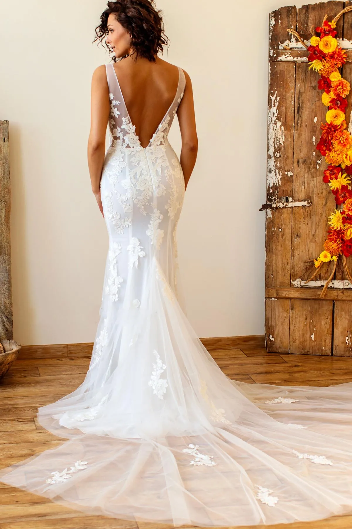 Elegant Designer Lace V-neck Mermaid Wedding Dress with Godet Train