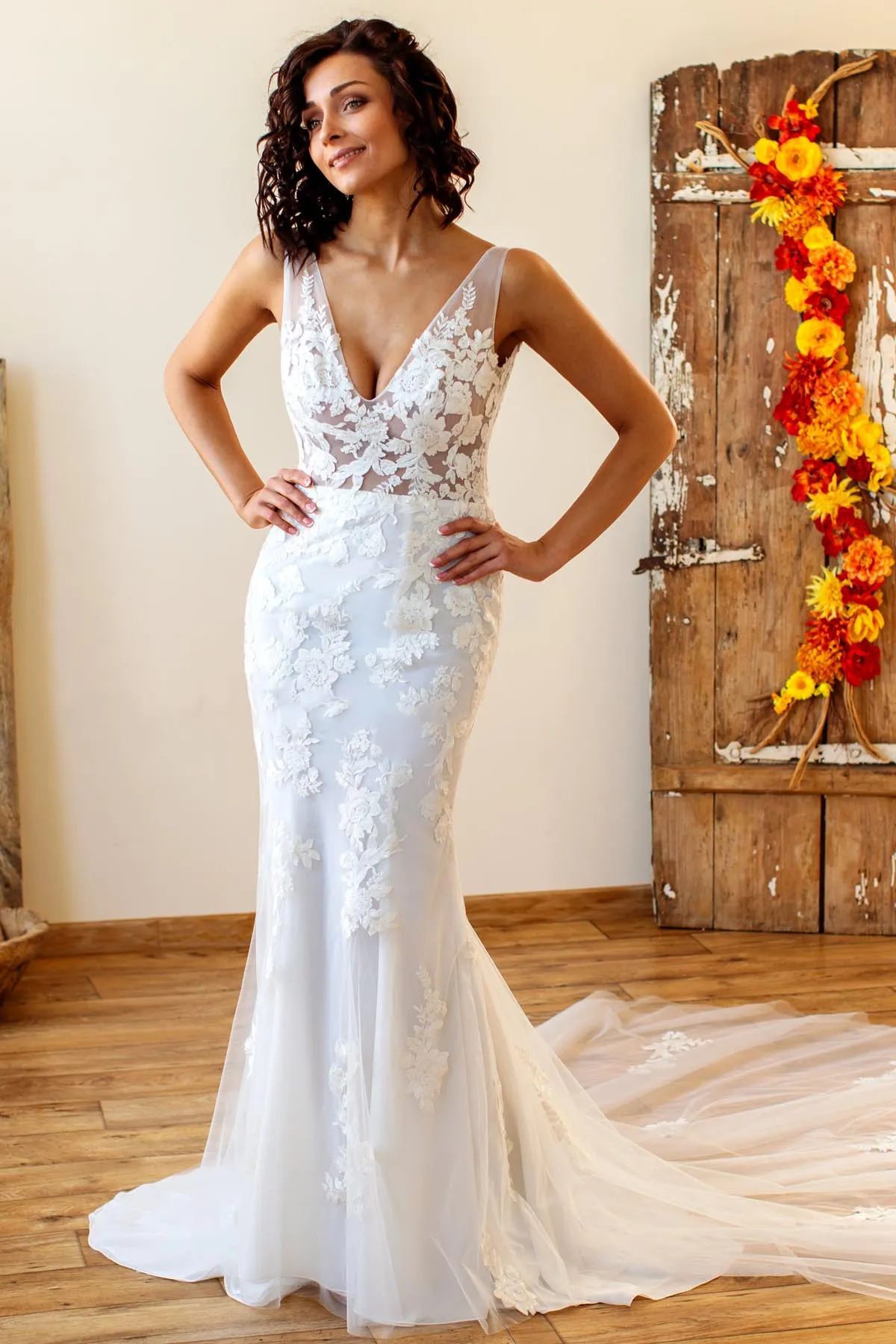 Elegant Designer Lace V-neck Mermaid Wedding Dress with Godet Train