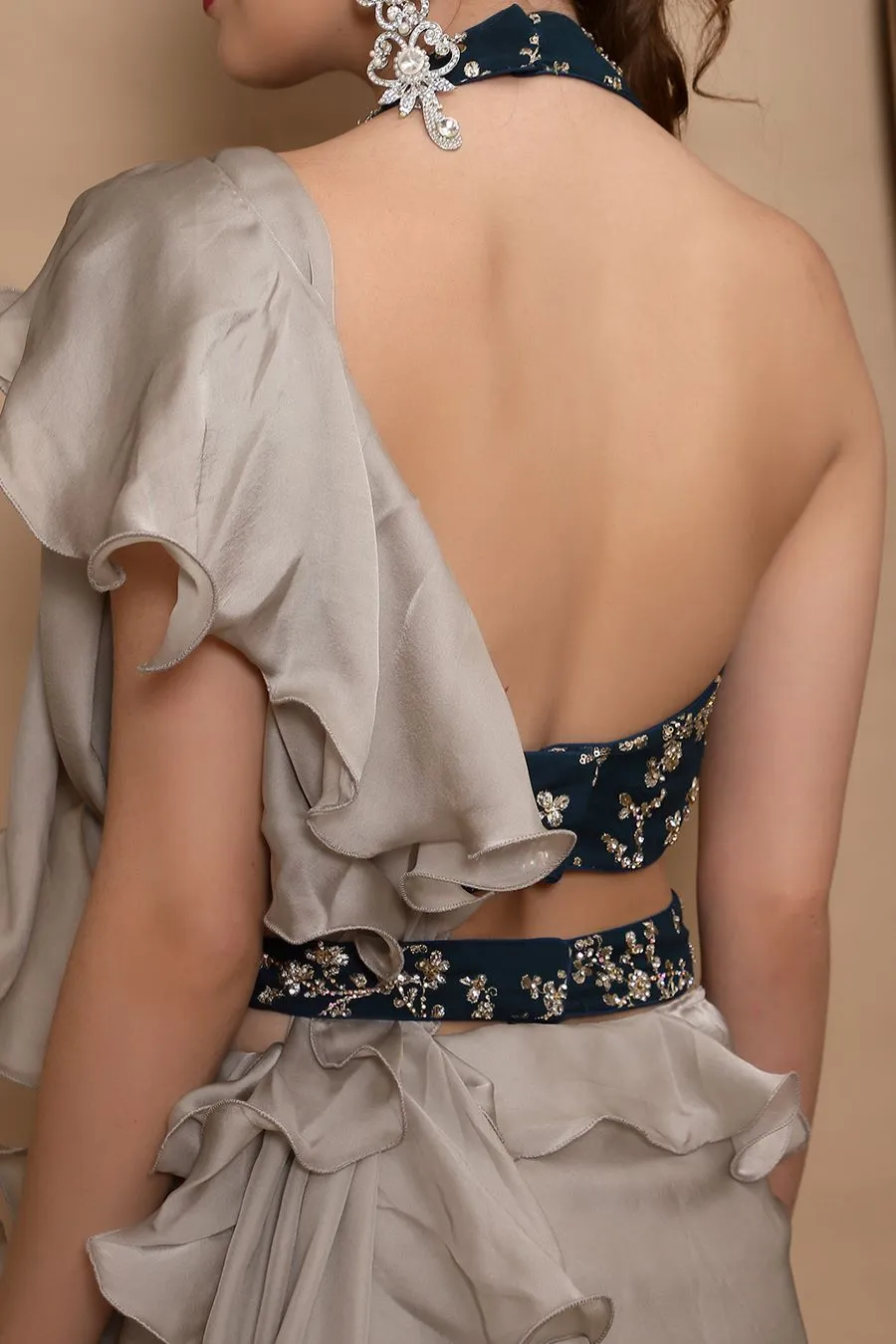 Grey Ruffle Saree with Peacock Green Halter Choli and Belt
